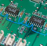 Describe the microprocessor and capacitor in PCB Boards.